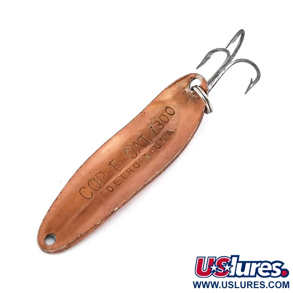 Dardevle Cop-E-Cat 7300 Blikstė, Kaltas varis, 10g, #10055