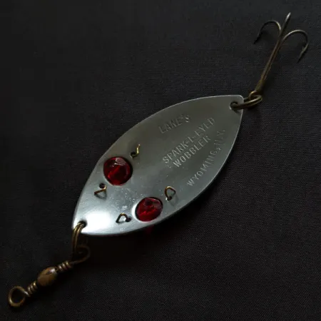 Lanes Tackle & Bait Lane's Spark-l-eyed wobbler, 25g, nikelis / raudonos akys, svyruojanti blizgė #18372