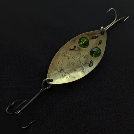 Hofschneider Red Eye Junior, 11g, auksinė/žalios akys, vartiklė #20747