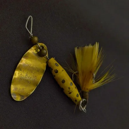 Glen Evans Shyster, 7 g, geltona/auksinė, suktukė #24227