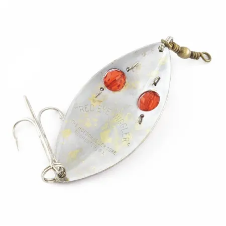 Hofschneider Red Eye Wiggler, 25g sidabrinė/žalvarinė su raudonomis akimis, vartiklė #24361