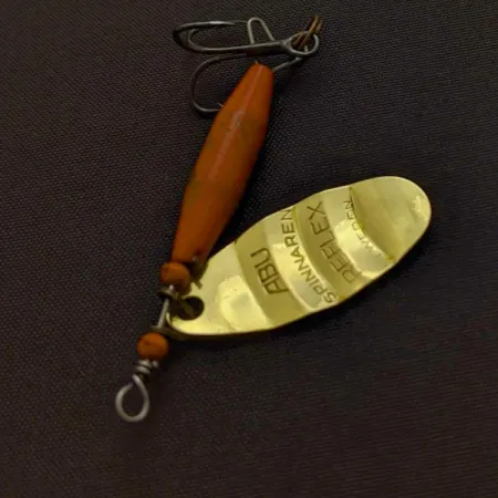 Abu Garcia Spinnaren Reflex Sukrė, Žalvaris/Raudona, 7g, #24456