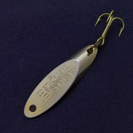 Acme Kastmaster Lartė, auksinė, 1/8 oz (3.5 g), žalvario pleištas, #24640