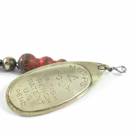 Mepps Aglia 4 Sukrė, Žalvaris, 9g, taškuoti karoliukai, #1347