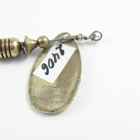 Mepps Aglia 2 Sukrė, Žalvaris, 4,5g, Raudonas Kembrikas, #2406