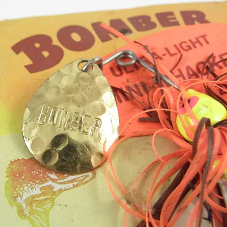 Bomber Bushwhacker Spinnerbait, Žalvaris, 7g, Plaktas Lapelis, #2809