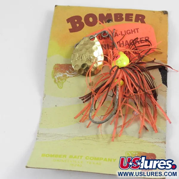 Bomber Bushwhacker Spinnerbait, Žalvaris, 7g, Plaktas Lapelis, #2809