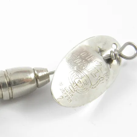 Luhr Jensen Tiger Tail Sukrė, Nikelis / Raudona, 3,6g, Plunksnos, #3464