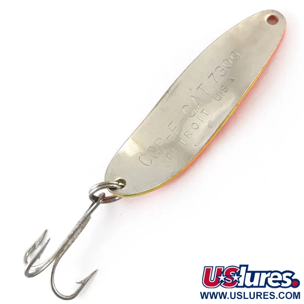 Dardevle Cop-E-Cat 7300 UV Blizgė, Geltona/Oranžinė/Nikelis, 10g, #4887