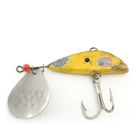 Mann's Bait Little George Tail Spinner, Nikelis/Geltona, 20g, #6646